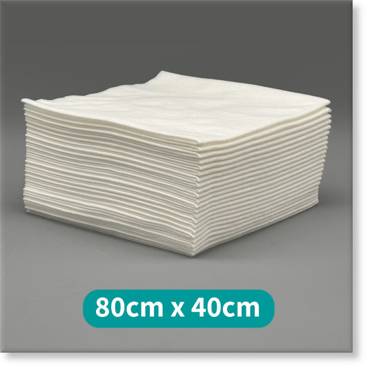 Tunika White Premium Disposable Salon Towels Image showing a large stack of 80cm by 40cm Towels
